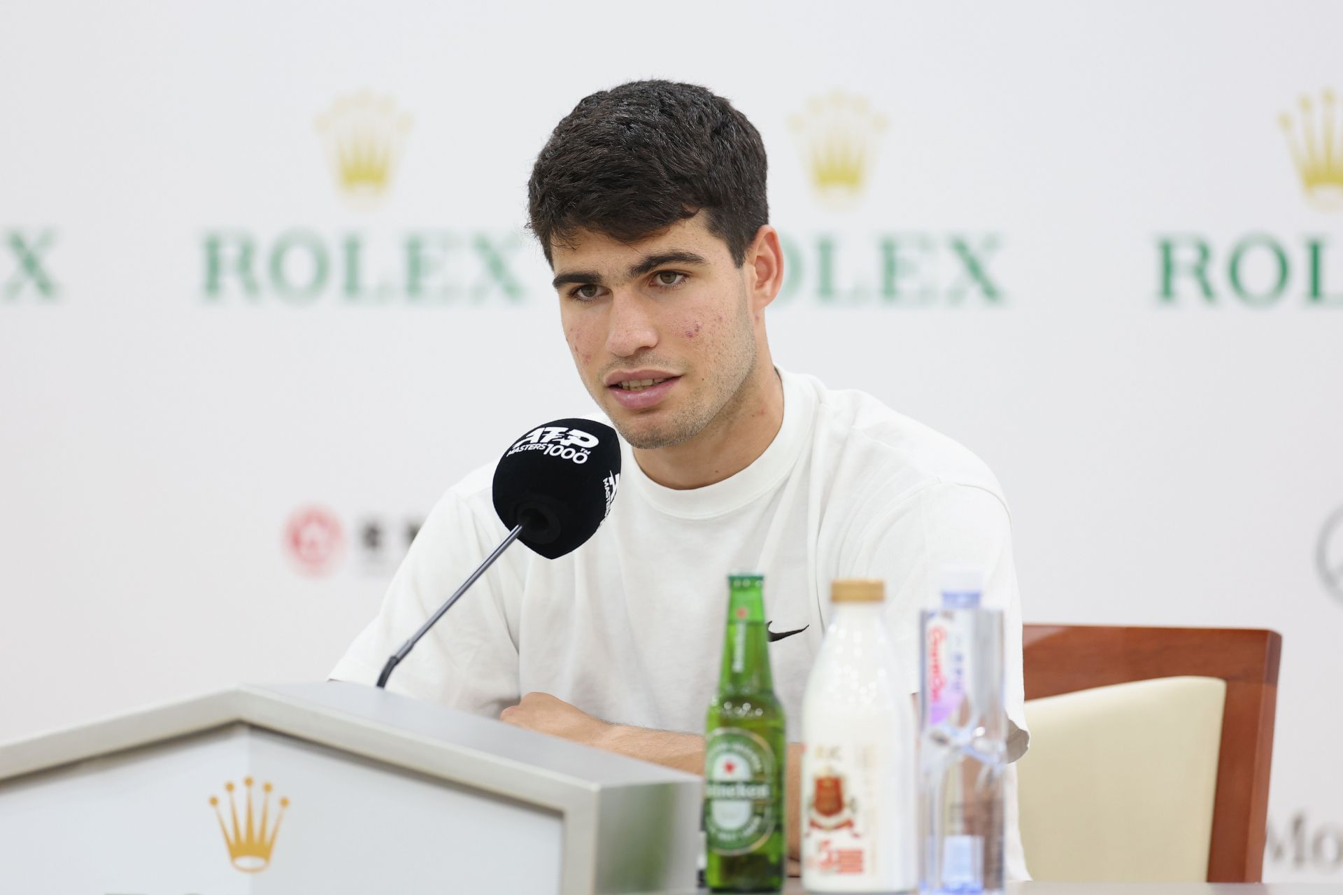 Carlos Alcaraz speaking at a press conference