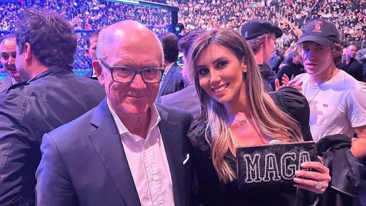 Woody Johnson is taking criticism for sitting with Donald Trump