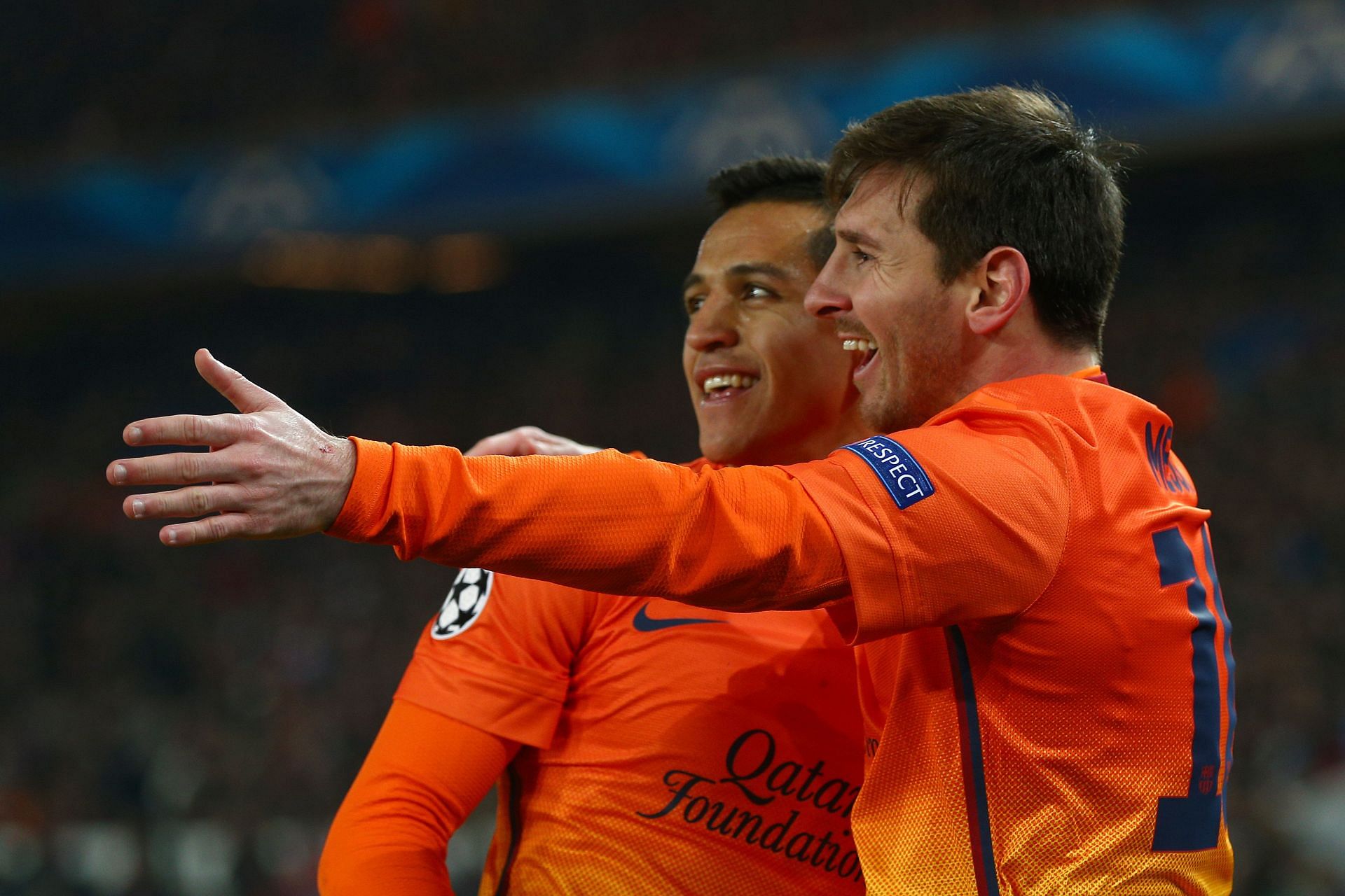 Alexis Sanchez and Lionel Messi (via Getty Images)