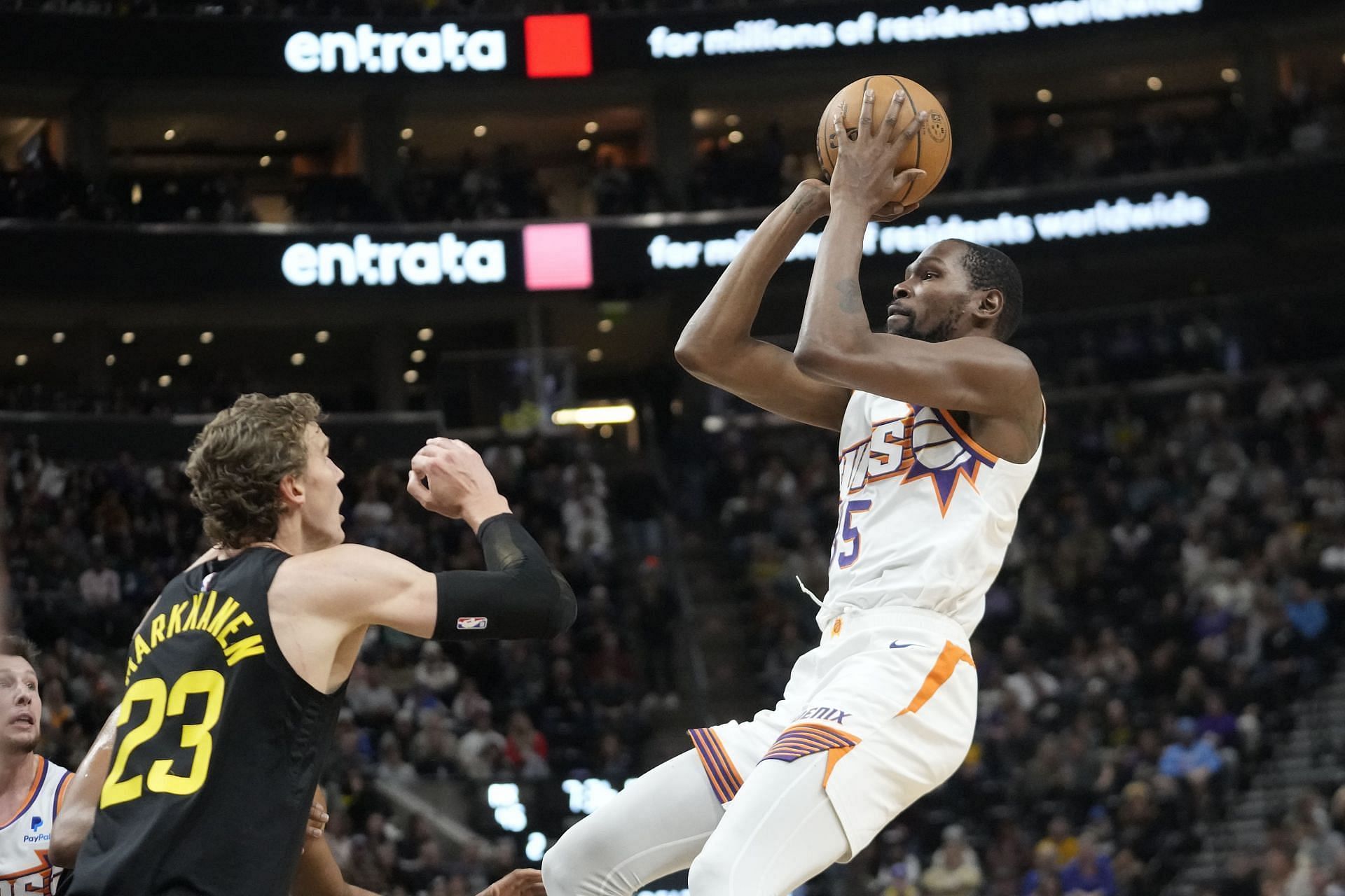 Kevin Durant going for a shot against Lauri Markkanen of the Utah Jazz.