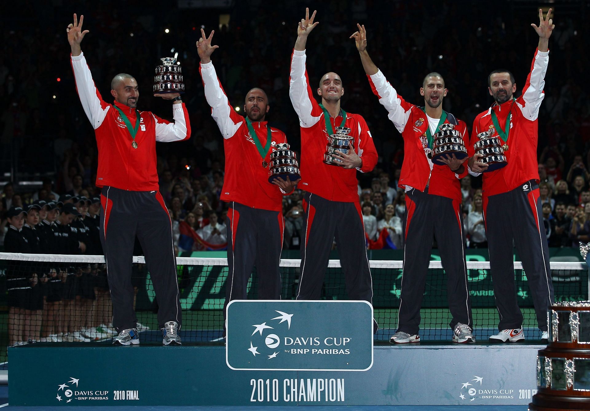 The Serbian team celebrates winning the 2010 Davis Cup.