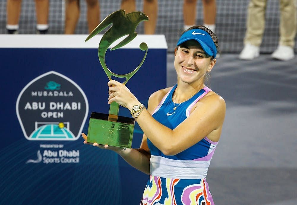 Belinda Bencic poses with the WTA 500 trophy in Abu Dhabi