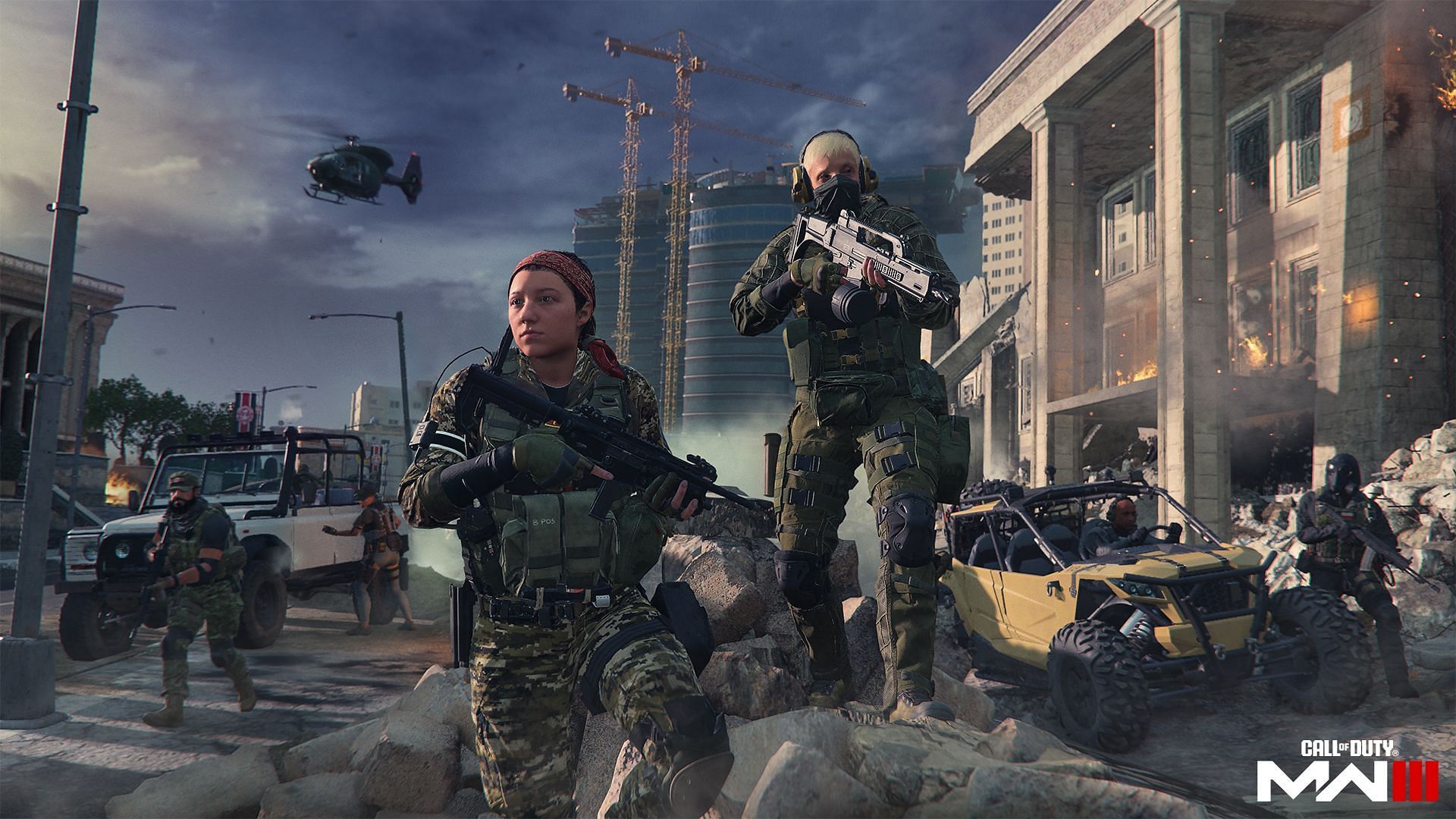 Few Operators holding their weapons against a few vehicles and a tall glass tower.