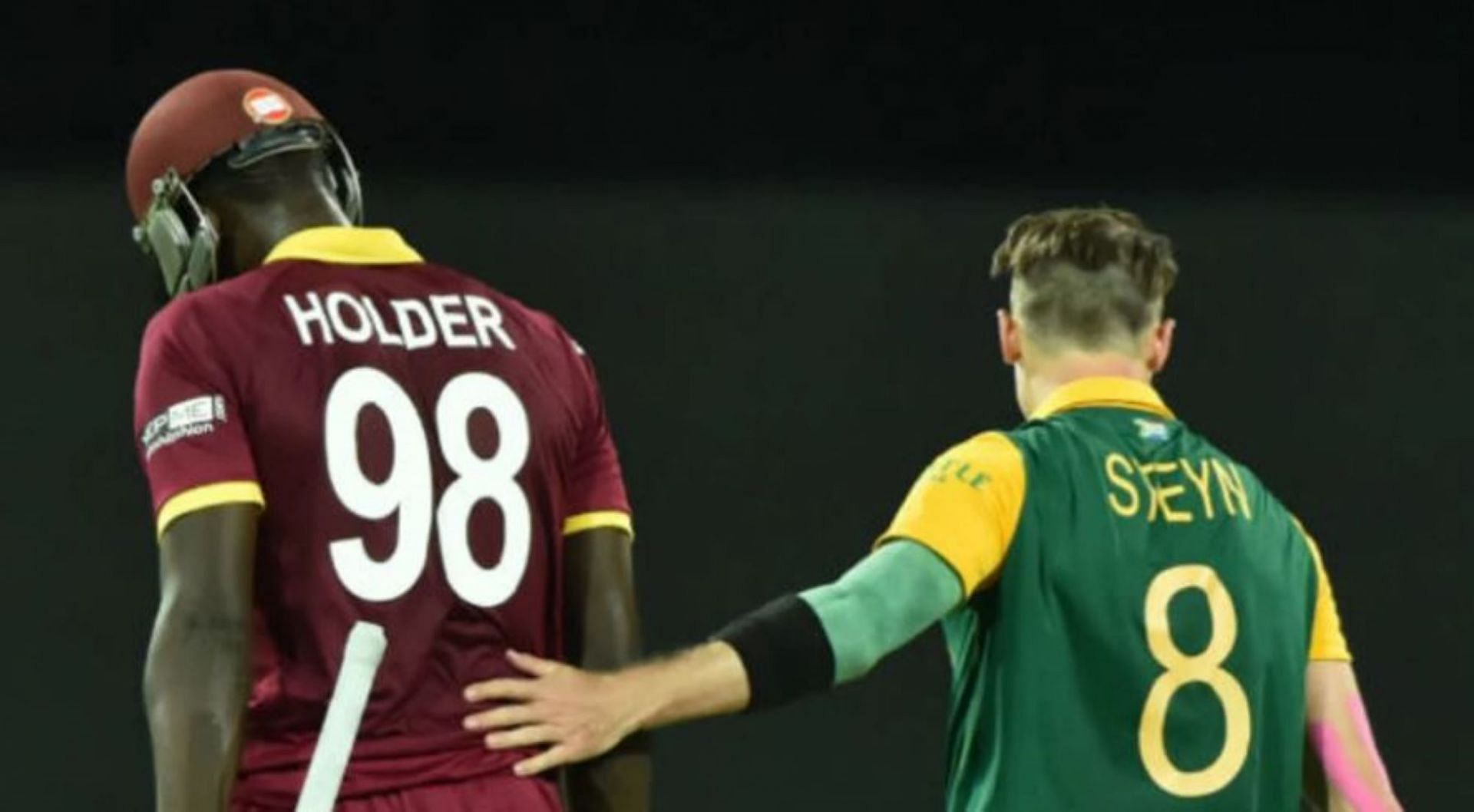 Dale Steyn pats Jason Holder for his half-century under trying circumstances.