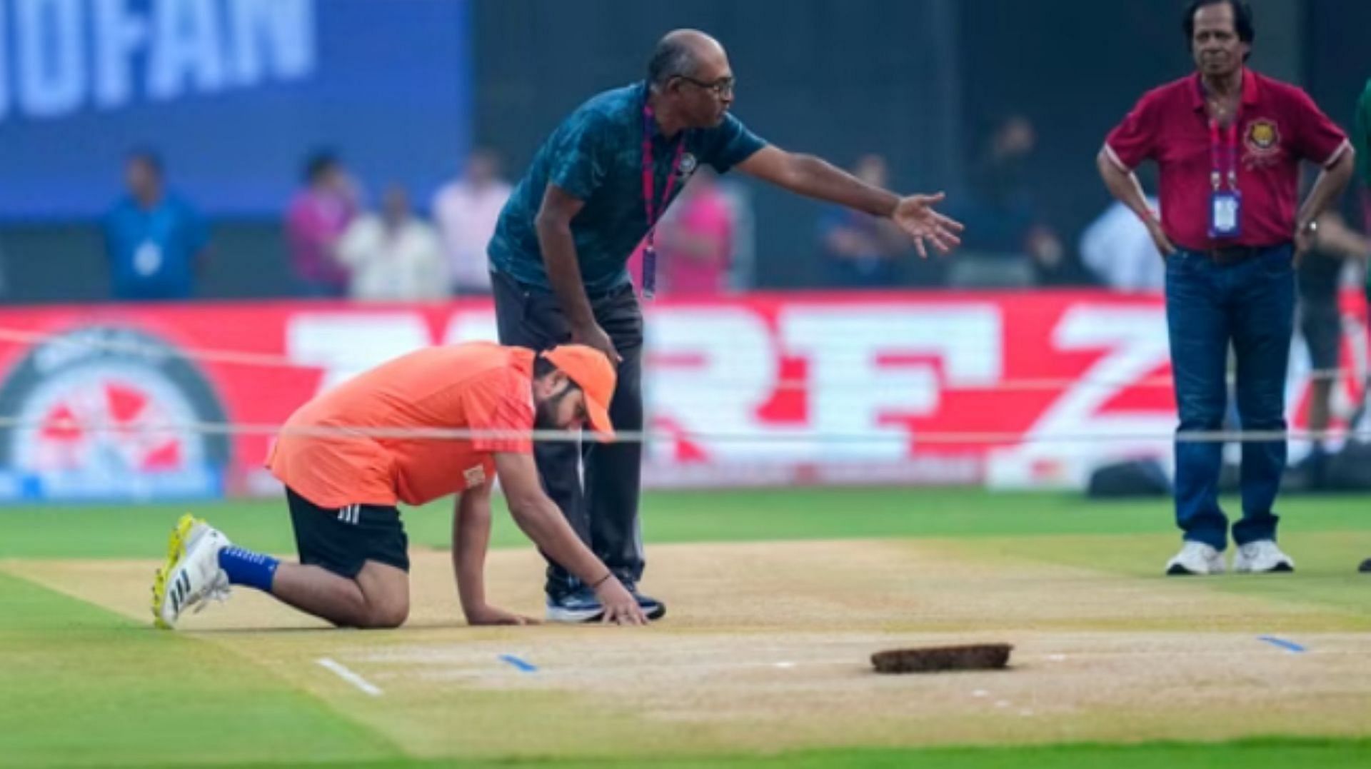 Rohit Sharma inspects the pitch at the Wankhede Stadium ahead of the 2023 World Cup semi-final