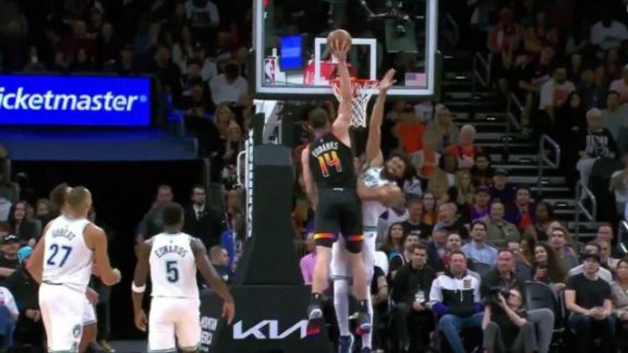 Drew Eubanks posterizes Karl-Anthony Towns in the Minnesota Timberwolves-Phoenix Suns game.