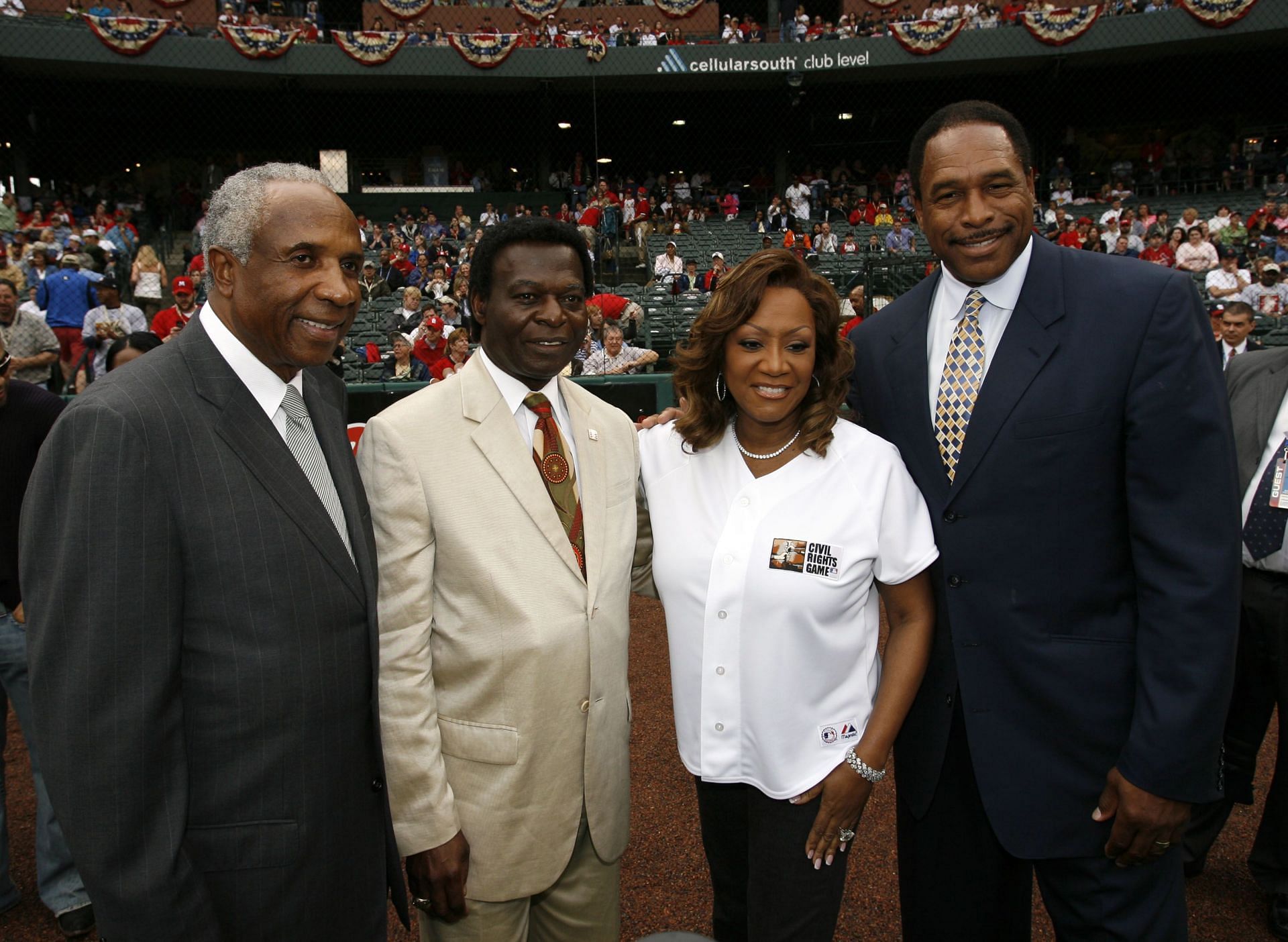 Major League Baseball legends Frank Robinson, Lou Brock and Dave Winfield, pose for a photograph with Patti LaBelle before a Cleveland Guardians vs. St. Louis Cardinals game on March 31, 2007 (Source: Getty)