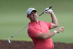 Watch: Rory McIlroy's tee shot finds an unexpected landing spot in spectator's Lap