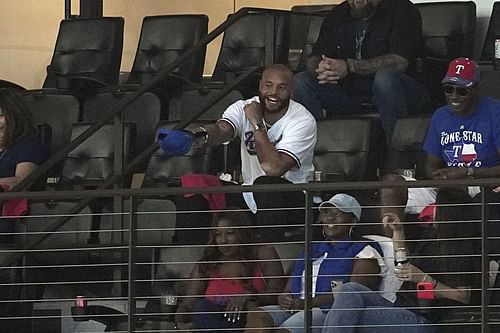 Dak Prescott of the Dallas Cowboys watches the Rangers.