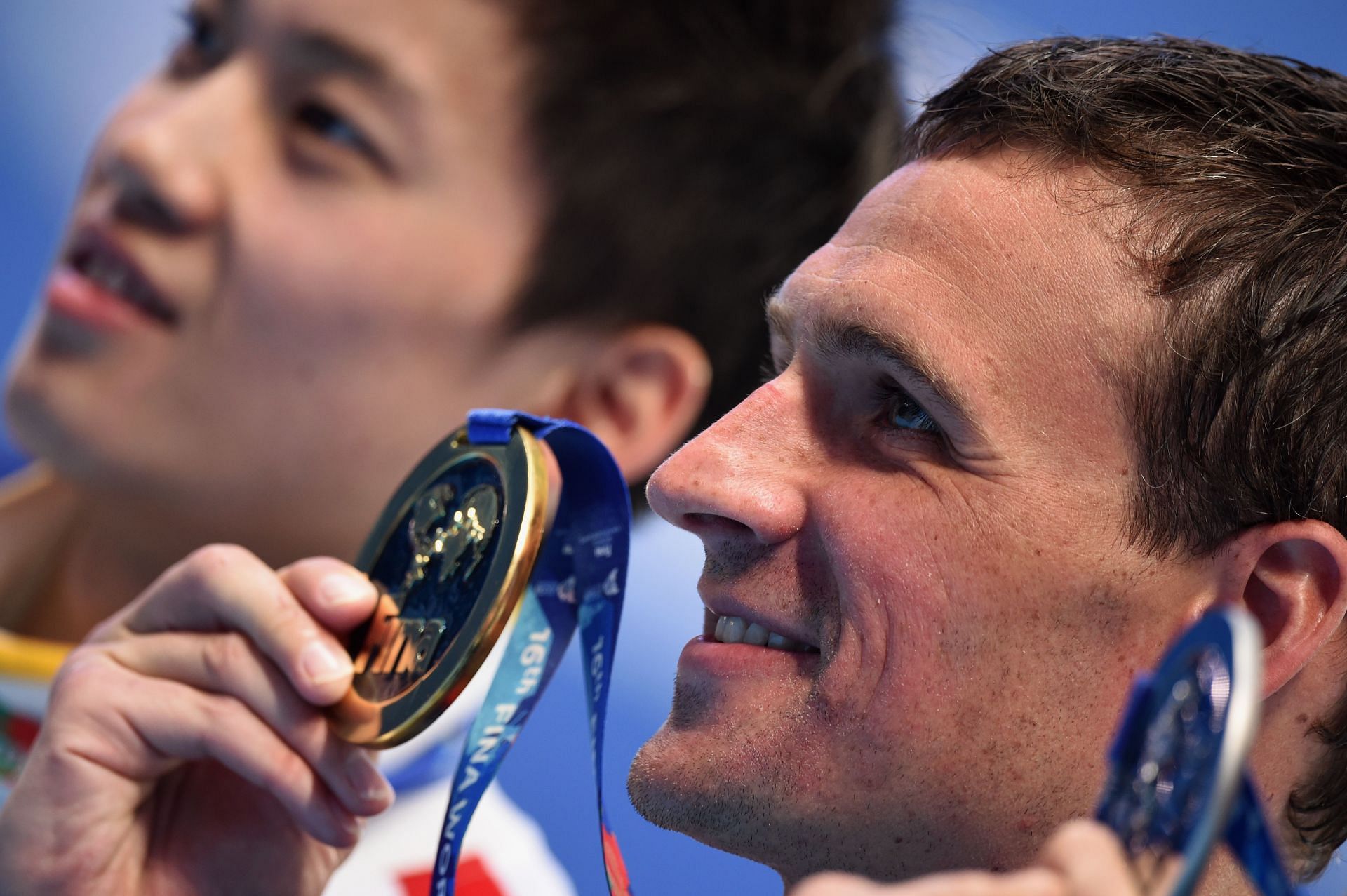 Gold medalist Ryan Lochte of the United States poses during the medal ceremony for the Men&#039;s 200m Individual Medley Final at the16th FINA World Championships