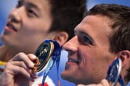 Gold medalist Ryan Lochte of the United States poses during the medal ceremony for the Men's 200m Individual Medley Final at the16th FINA World Championships