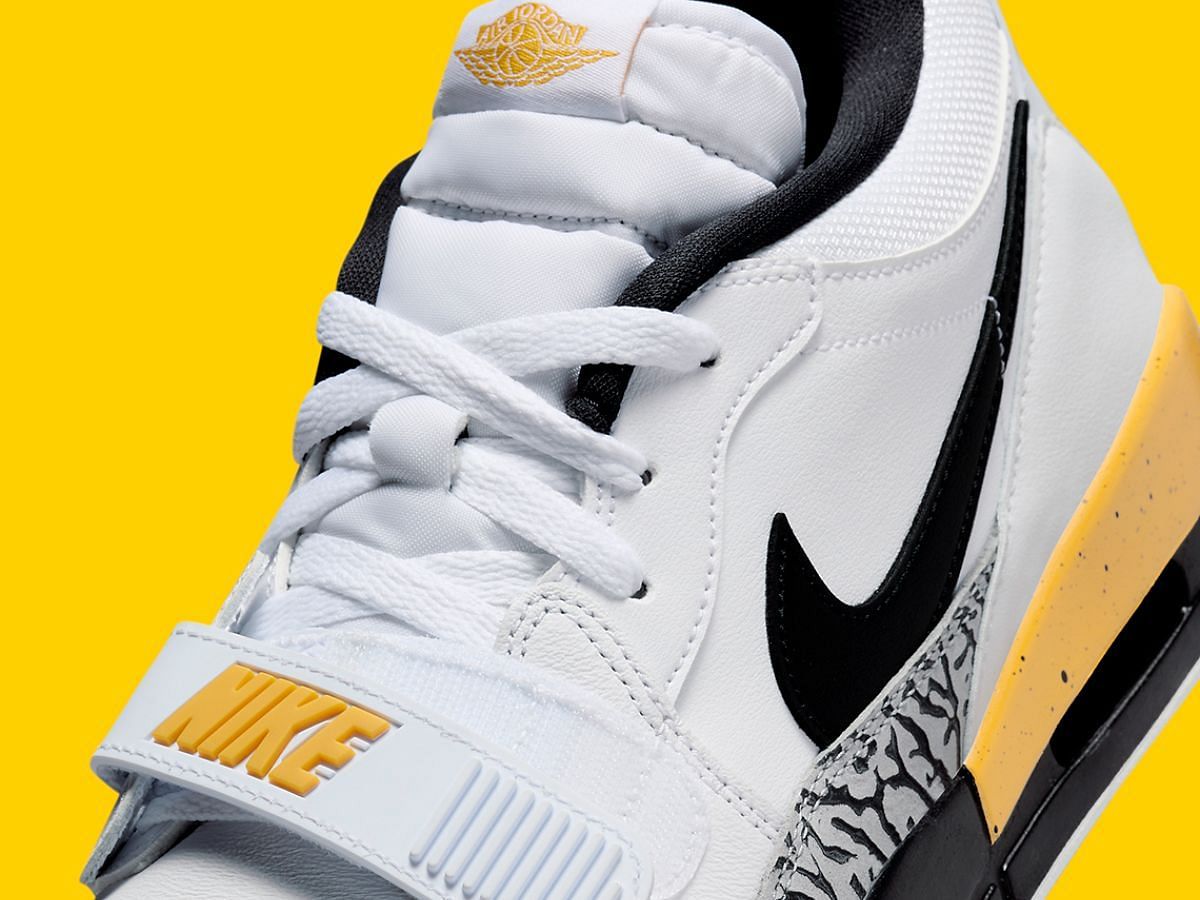 Jordan 312 Low White/Yellow/Black sneakers (Image via Sneaker News)