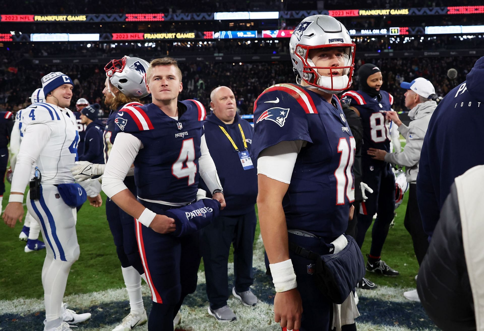 Bailey Zappe (4) and Mac Jones (10) after Indianapolis Colts v New England Patriots