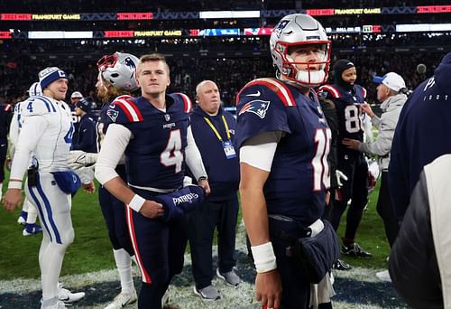 Bailey Zappe (4) and Mac Jones (10) after Indianapolis Colts v New England Patriots