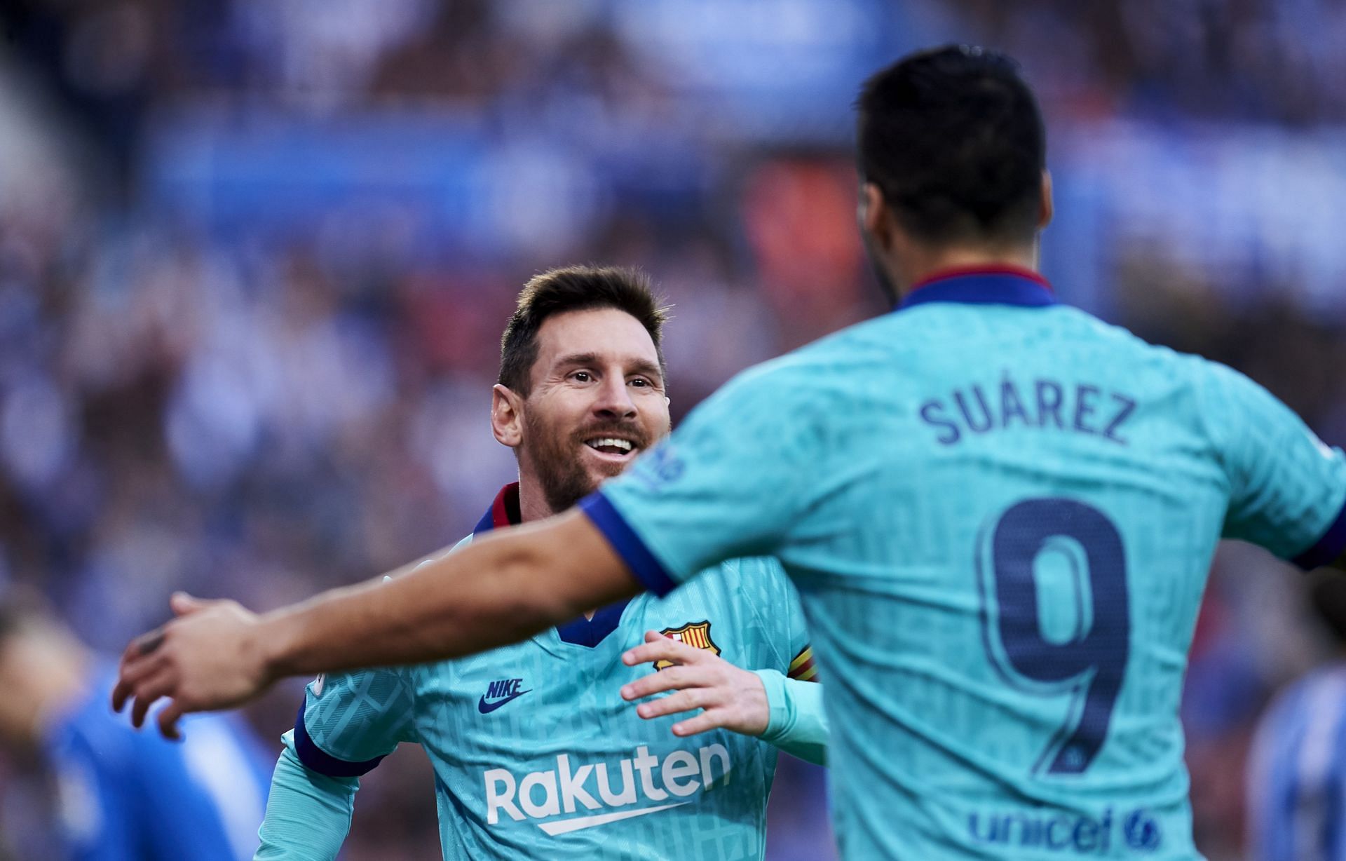 Lionel Messi and Luis Suarez (via Getty Images)