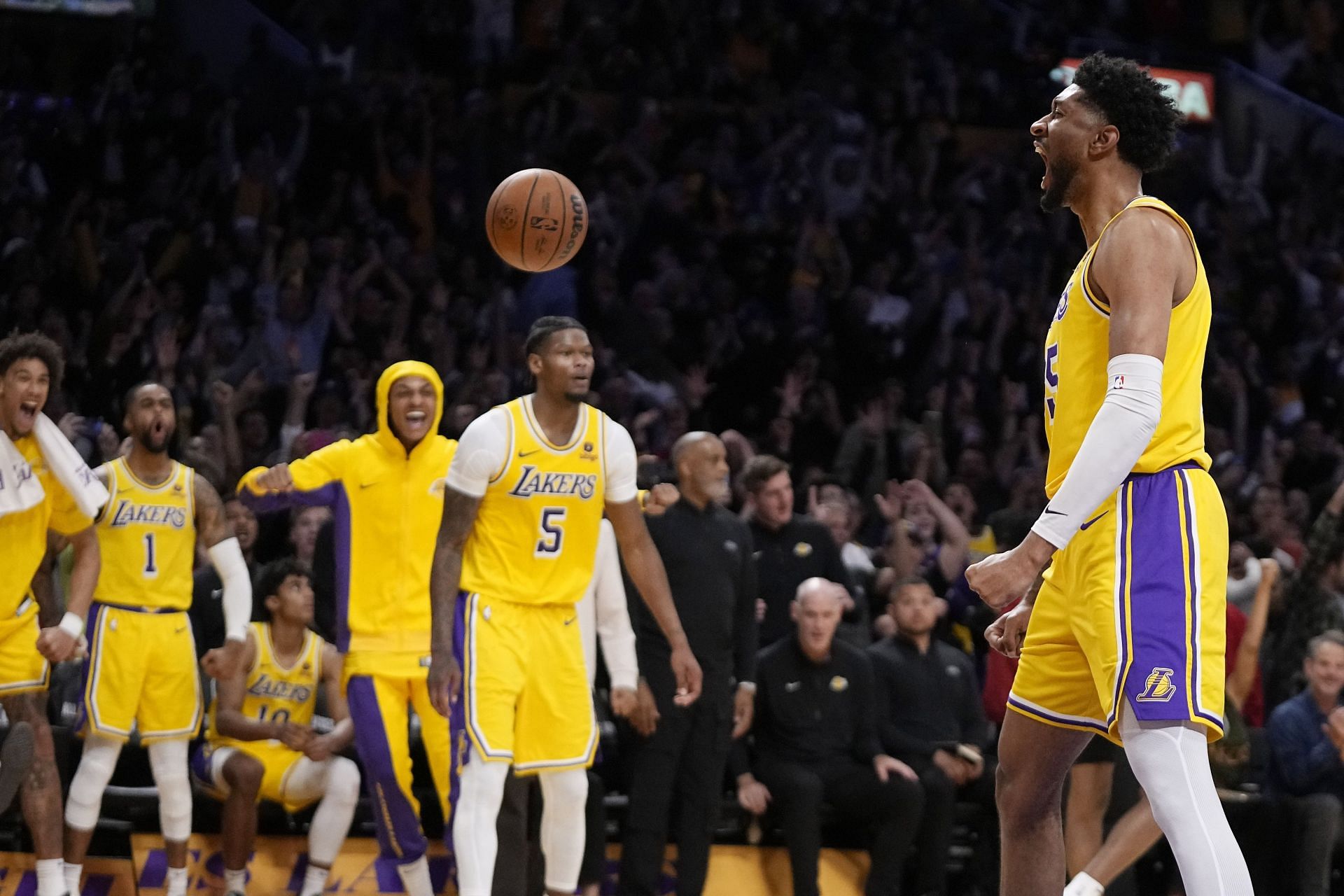 Christian Wood celebrates with his LA Lakers teammates