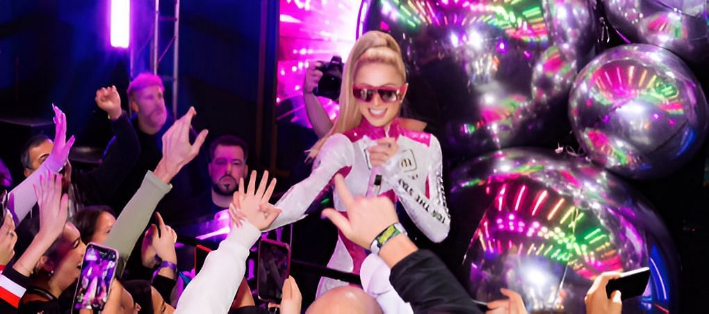 Paris Hilton plays at F1 event (image via @ParisHilton on X)