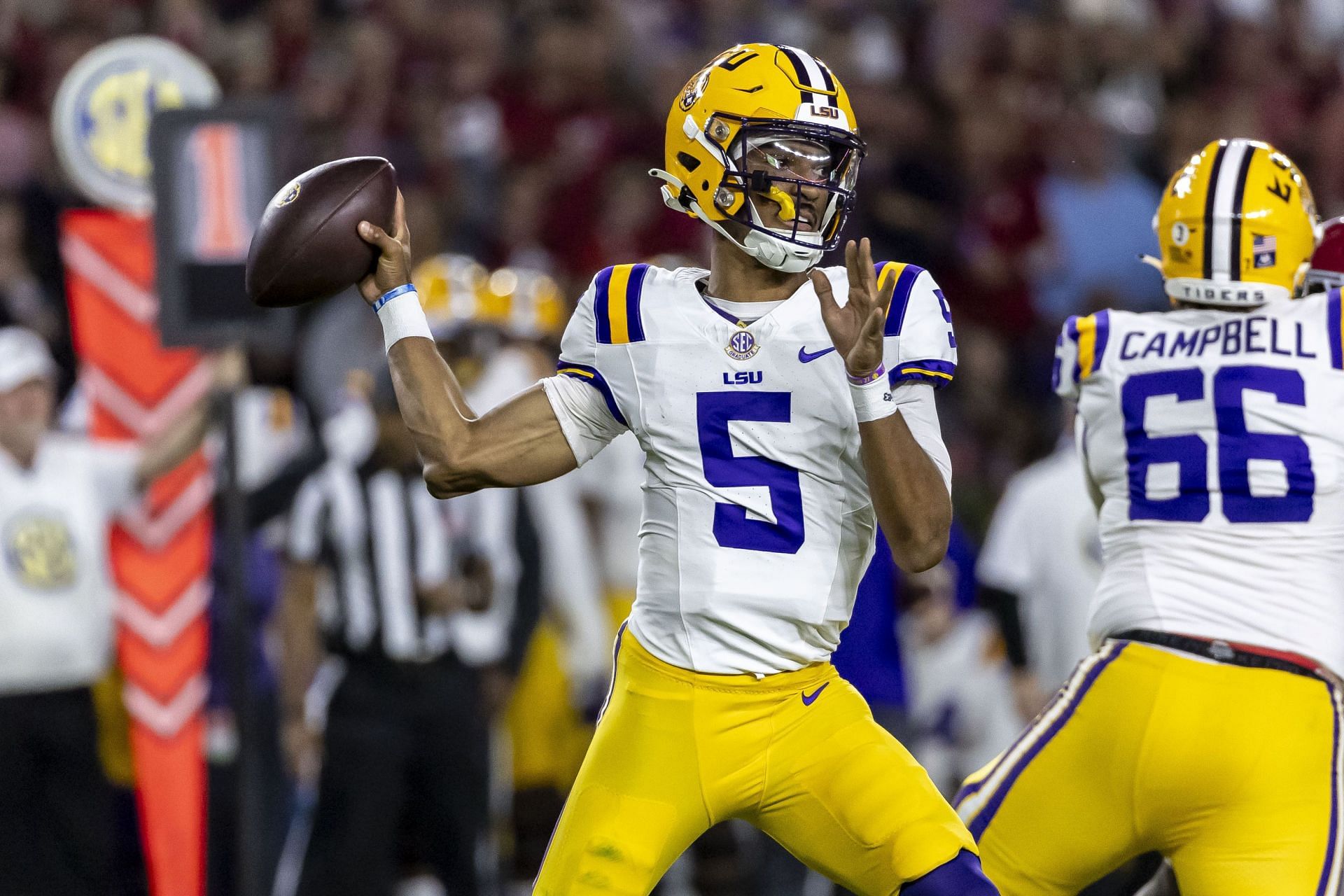 Jayden Daniels injury LSU QB enters concussion protocol after taking a