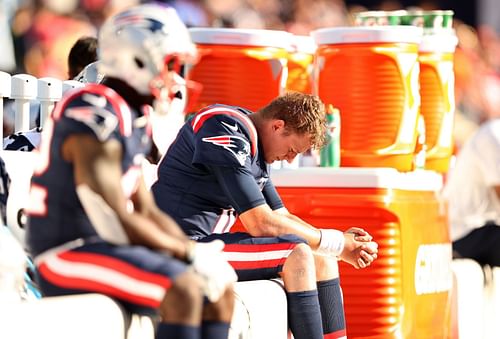 New England Patriots QB Mac Jones on the bench