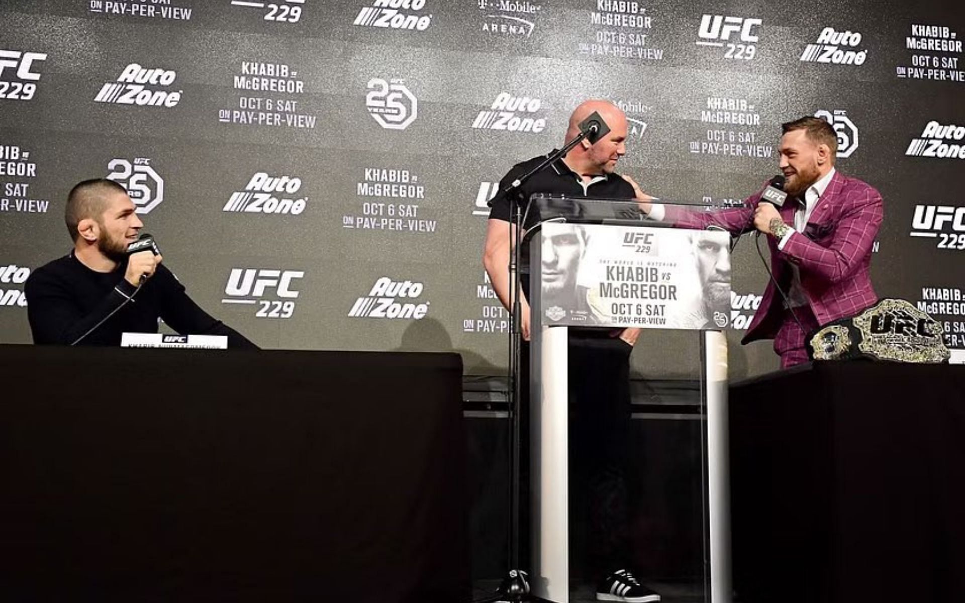 Khabib Nurmagomedov (left) and Conor McGregor (right) during the UFC 229 press conference (Image courtesy @JayMMA4 on X)