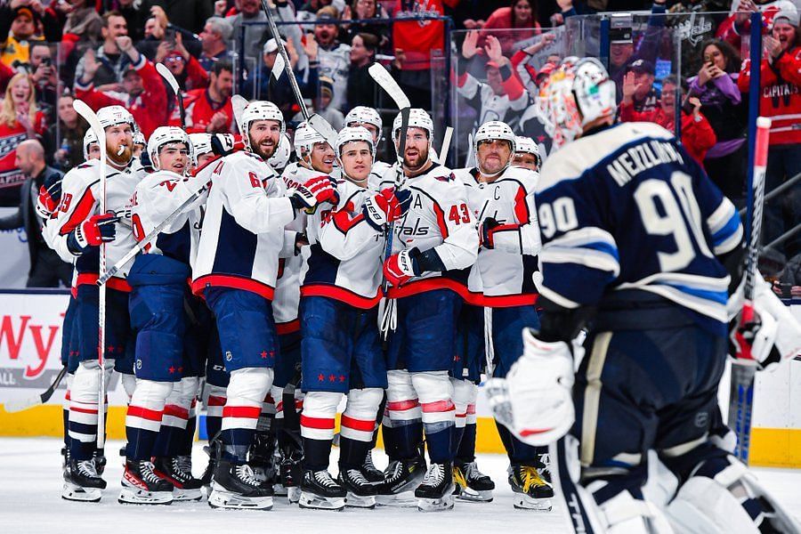 NHL fans react to viral image of Washington Capitals squad staring at Elvis Merzlikins