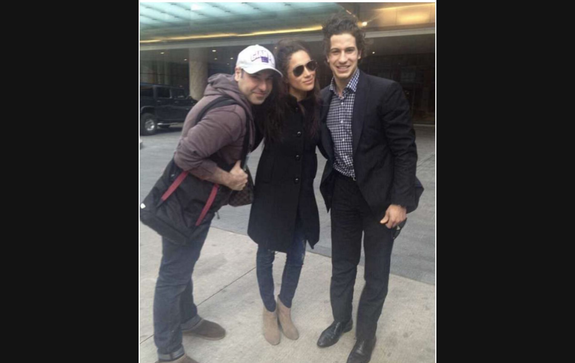 Michael Del Zotto with Meghan Markle and Rick Hoffman (Image via Spittin&#039; Chiclets)