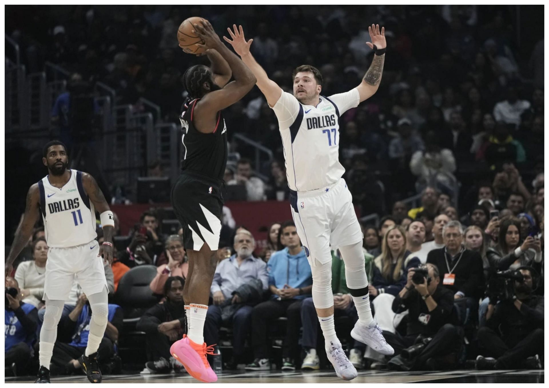 James Harden (left) and Luka Doncic (right) collide as the Dallas Mavericks face the LA Clippers on Wedesday, December 20 (AP Photo/Jae Hong)