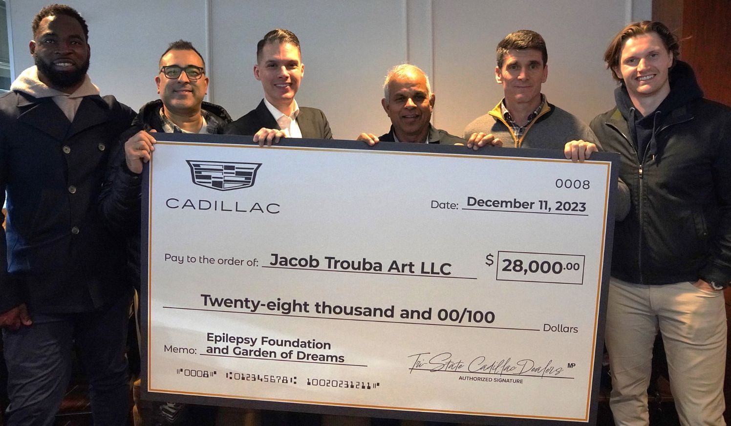 Jacob Trouba thanks Tri-State Cadillac dealers for $28,000 donation to Rangers defenseman