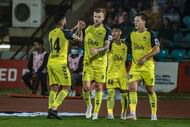 The Hyderabad players congratulating Petteri Pennanen (7) on his goal. (HYD)