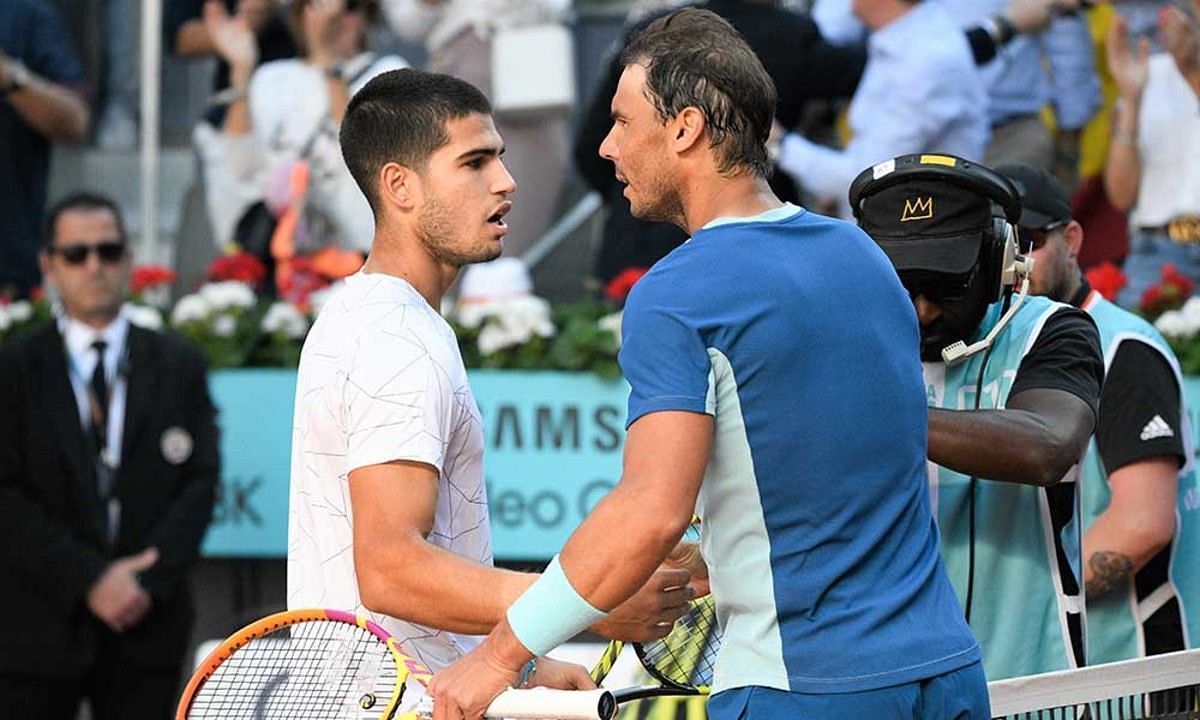 Carlos Alcaraz and Rafael Nadal embrace each other after their quarterfinals clash at the 2022 Madrid Masters
