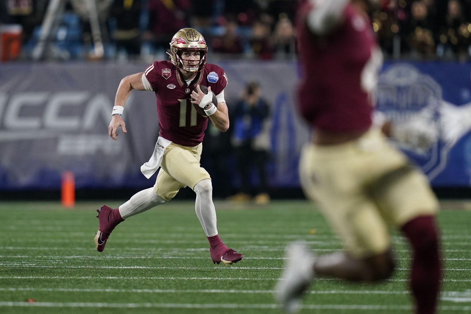 ACC Championship Football: Florida State quarterback Brock Glenn runs the ball against Louisville during the first half of the Atlantic Coast Conference championship NCAA college football game Saturday, Dec. 2, 2023, in Charlotte, N.C. (AP Photo/Erik Verduzco)