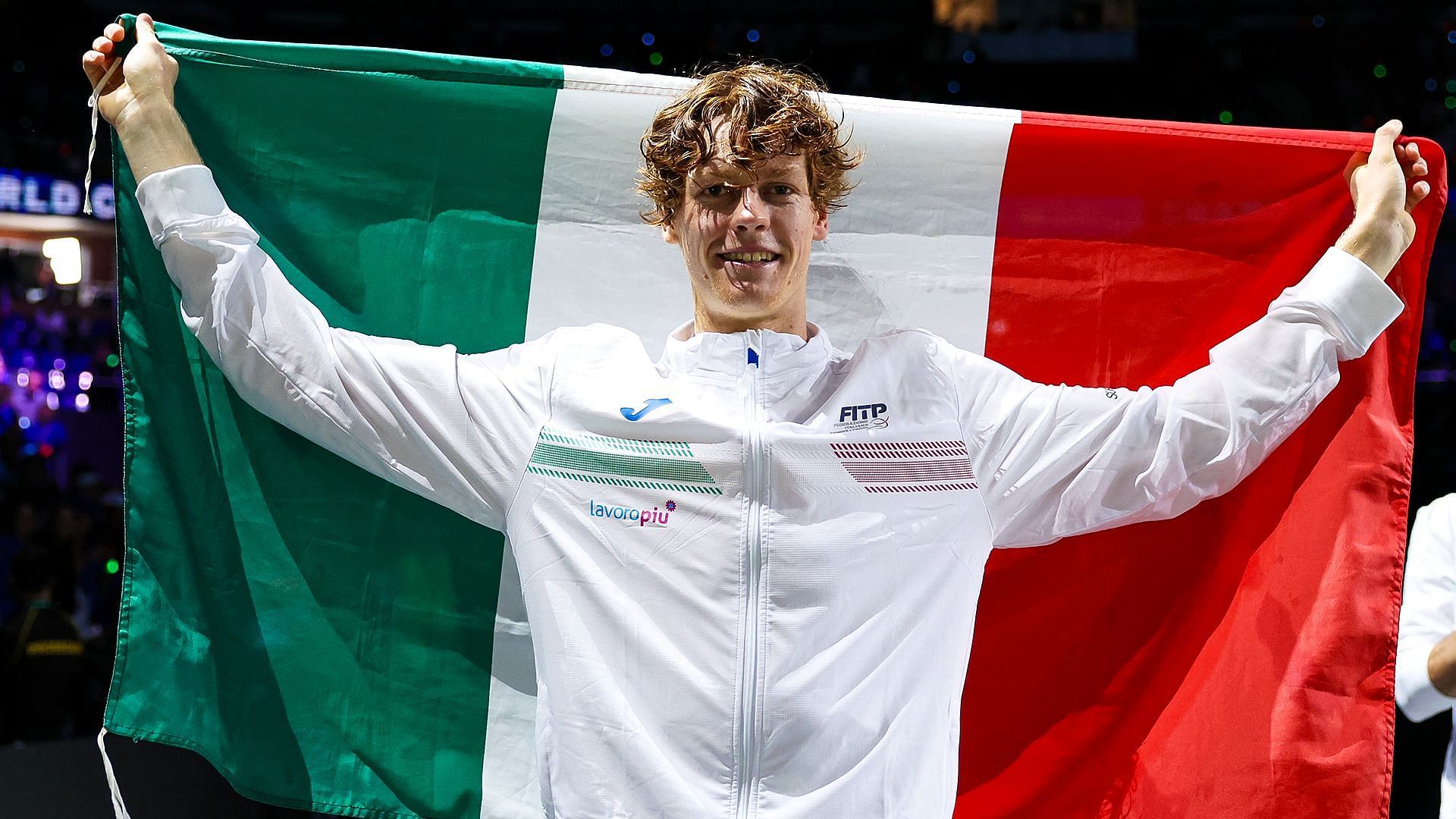 Jannik Sinner with Italian flag