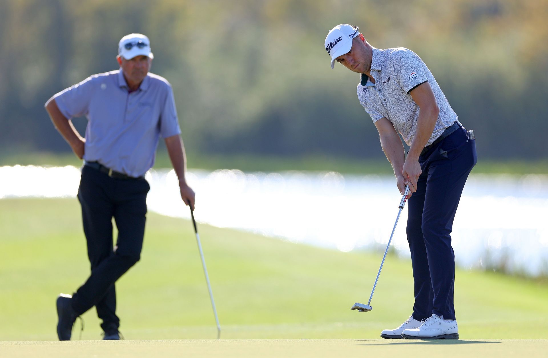 Justin Thomas and Mike Thomas (Image via Mike Ehrmann/Getty Images)