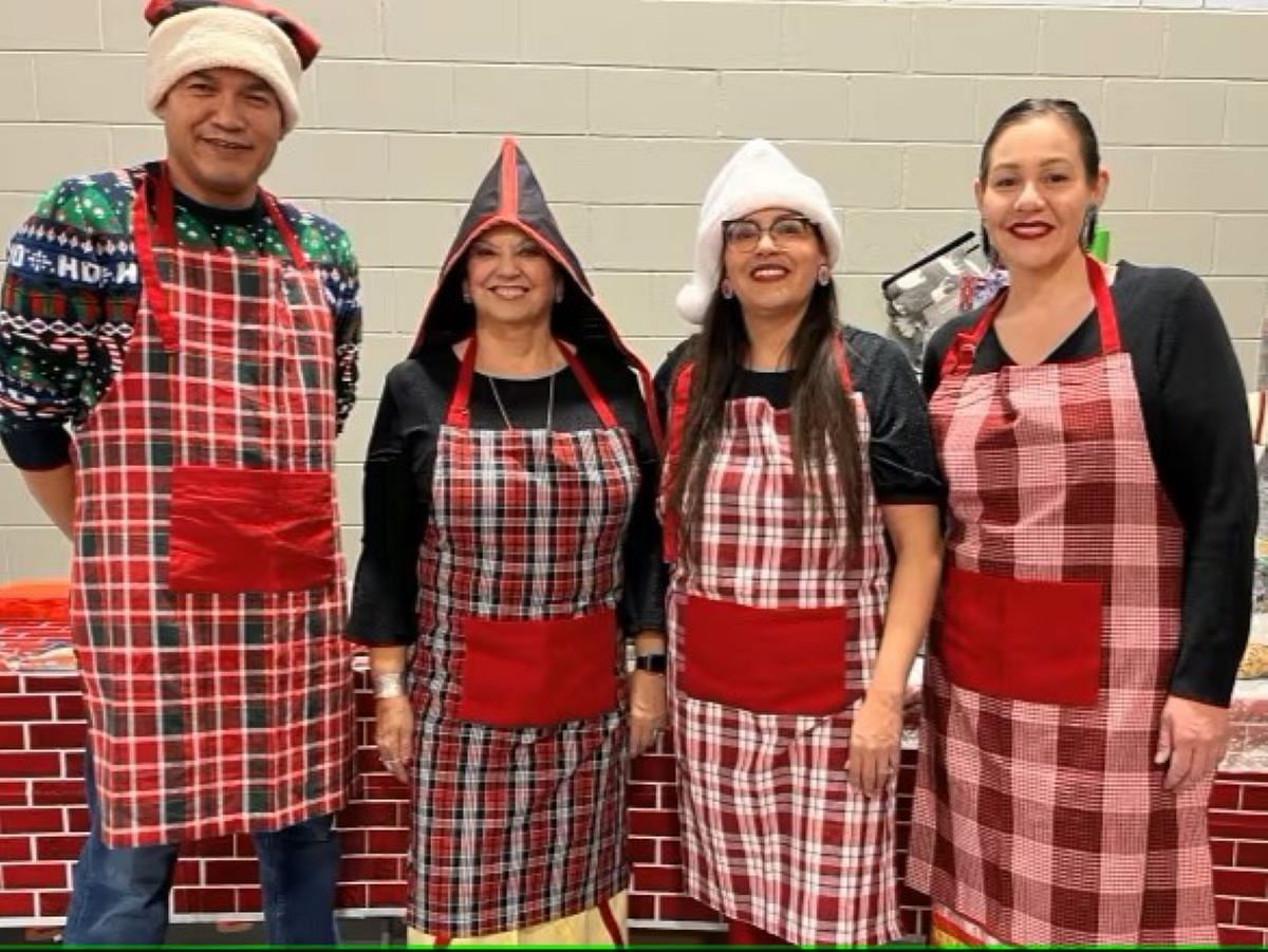 Chief Darlene Bernard (second from left) celebrates the event with members of the community (image via CBC)