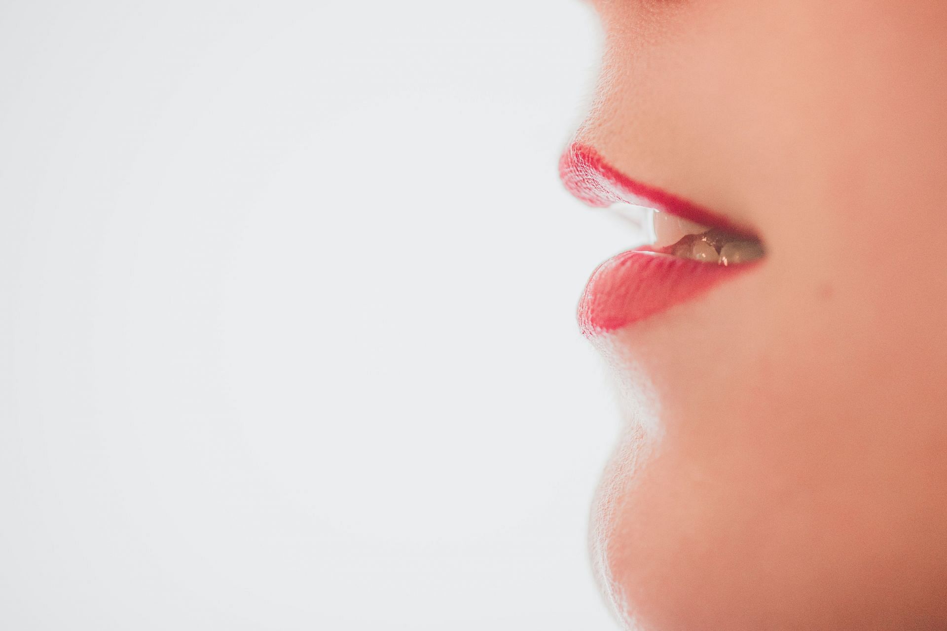 Lips (Image via Unsplash/Timothy Dykes)