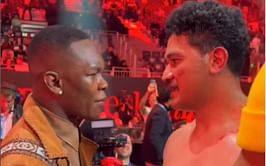 Israel Adesanya caught on camera consoling Kiwi boxer Junior Fa after loss with a pat on the backside [VIDEO]