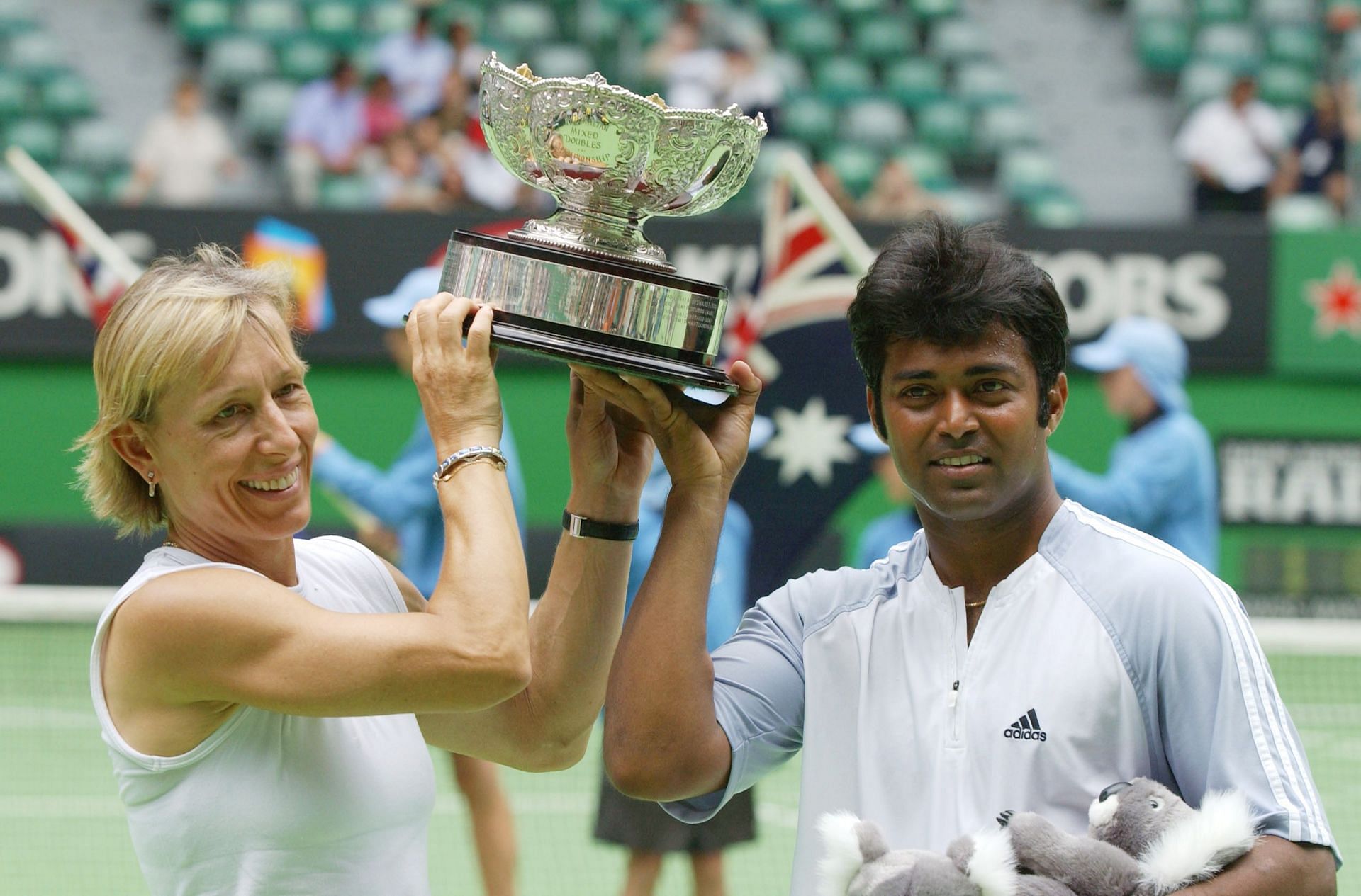 MELBOURNE - JANUARY 26:  Martina Navratilova and Leander Paes celebrate