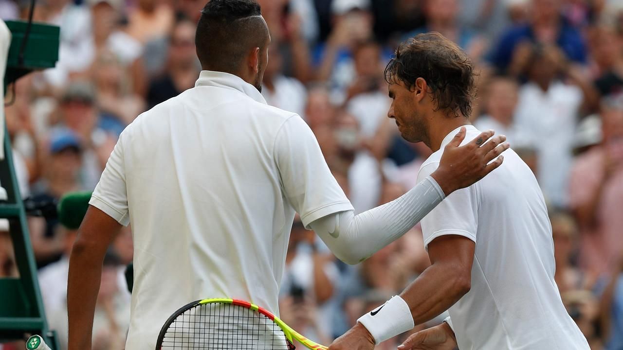 Nick Kyrgios (L) and Rafael Nadal greet each other after their Wimbledon 2019 clash