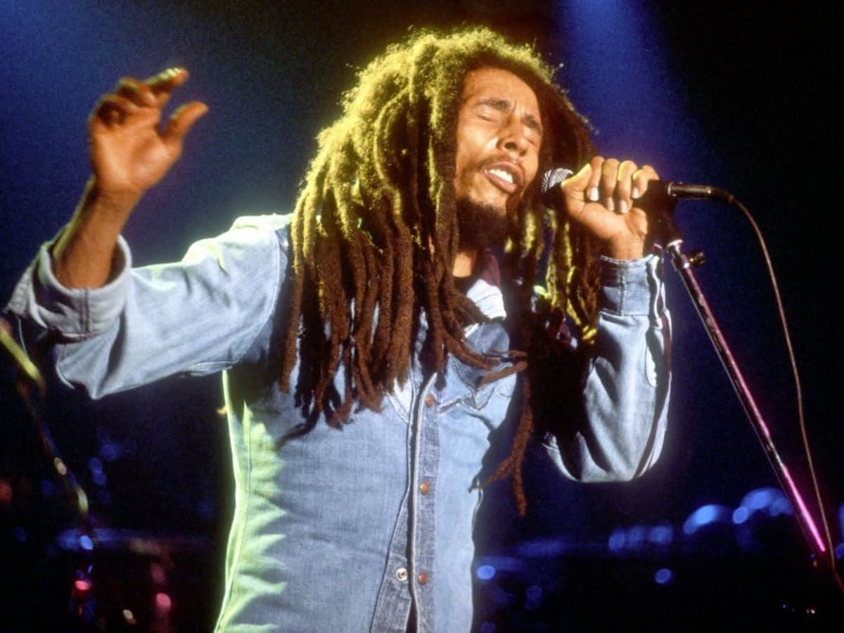 Marley performing at a concert (image via Getty)