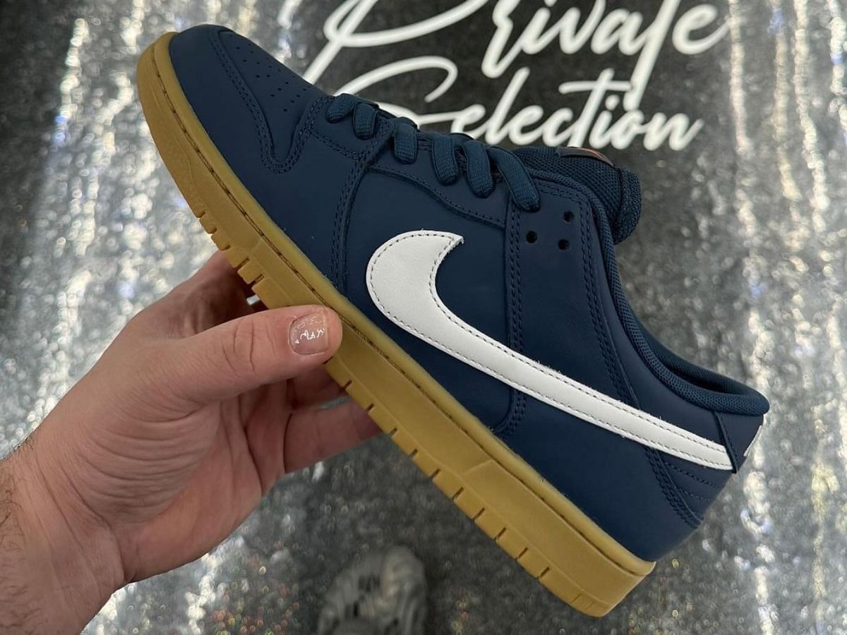 Nike SB Dunk Low Navy/White-Gum Light Brown sneakers (Image via SBD)