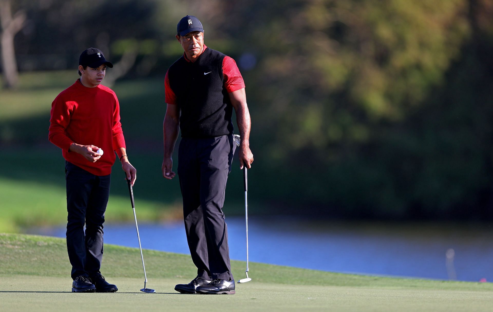 Tiger Woods and Charlie Woods (Image via Mike Ehrmann/Getty Images)