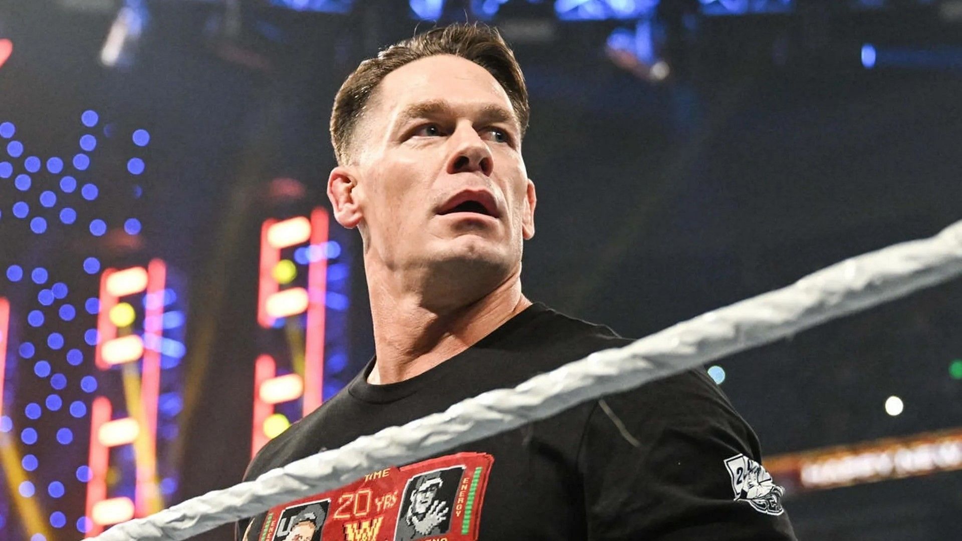 John Cena stands tall inside the WWE ring
