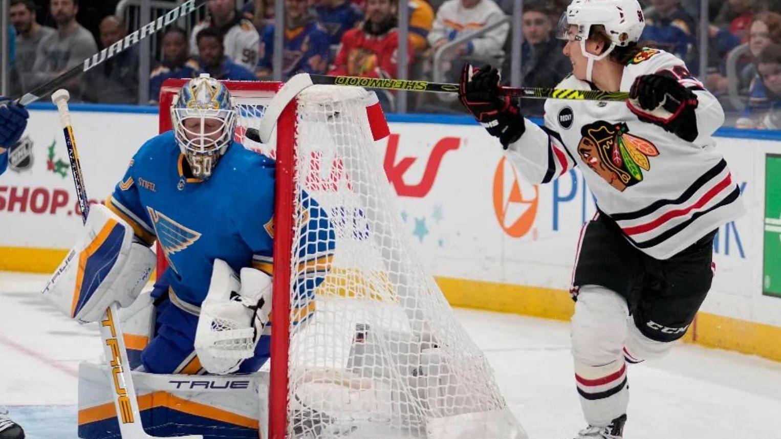 Jordan Binnington catches flak for Connor Bedard