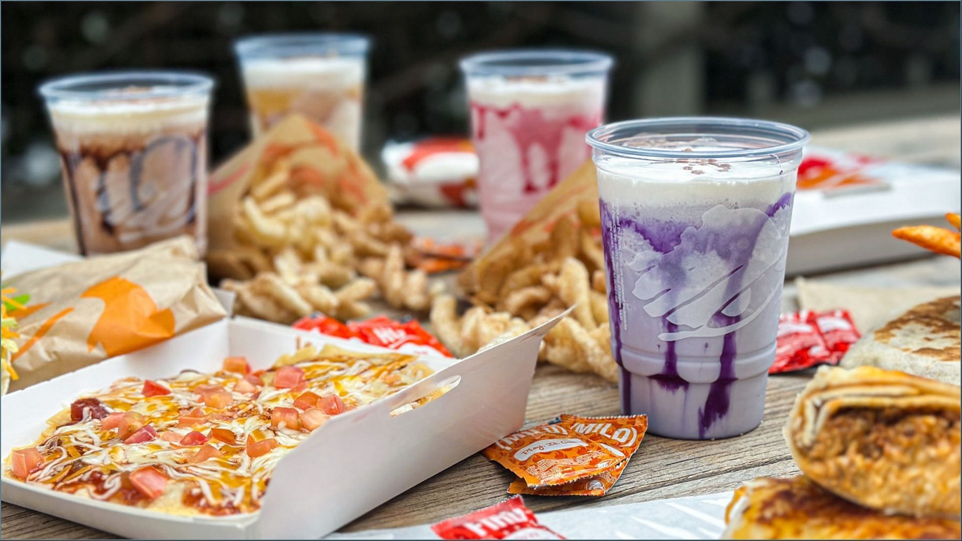 The new Coffee and Churro Chillers hit stores on December 15 (Image via Taco Bell / Food Beast)