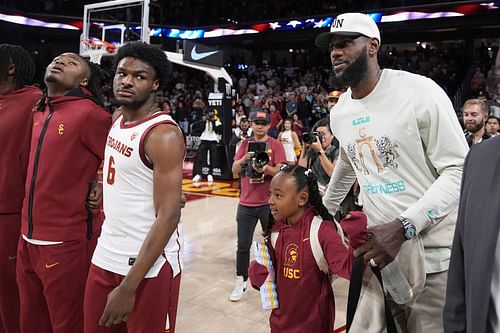 LeBron James watched Bronny James' debut for USC on Sunday.