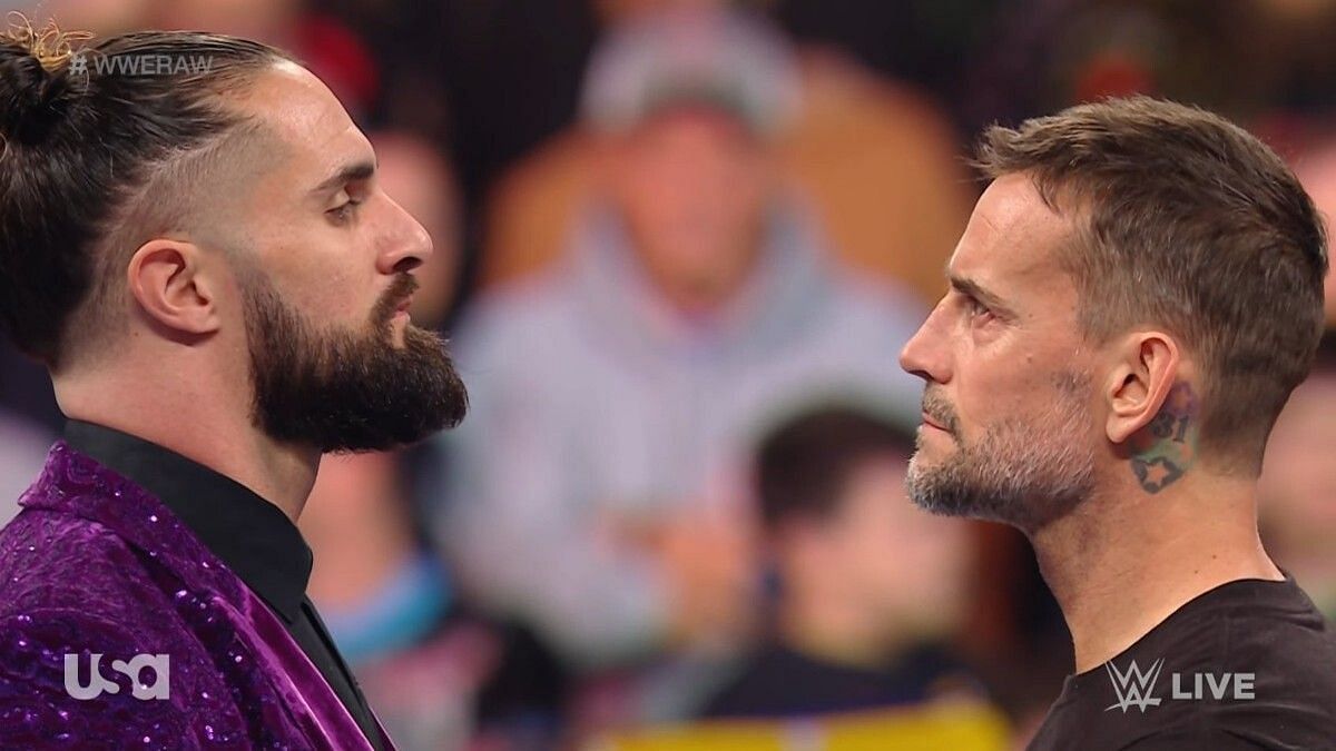 Seth Rollins and CM Punk in action during December 11th episode of RAW
