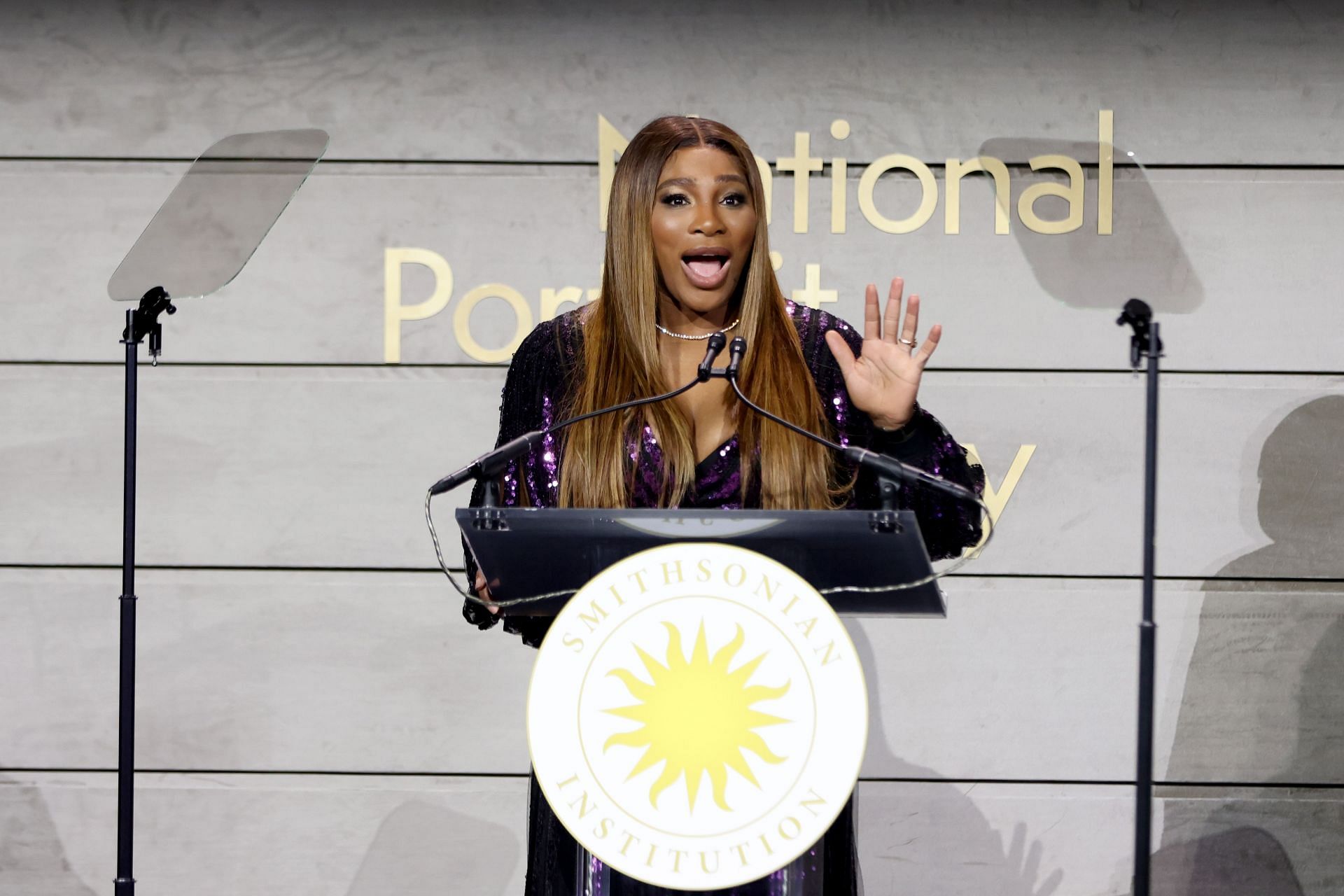 Serena Williams addresses a gathering at an event