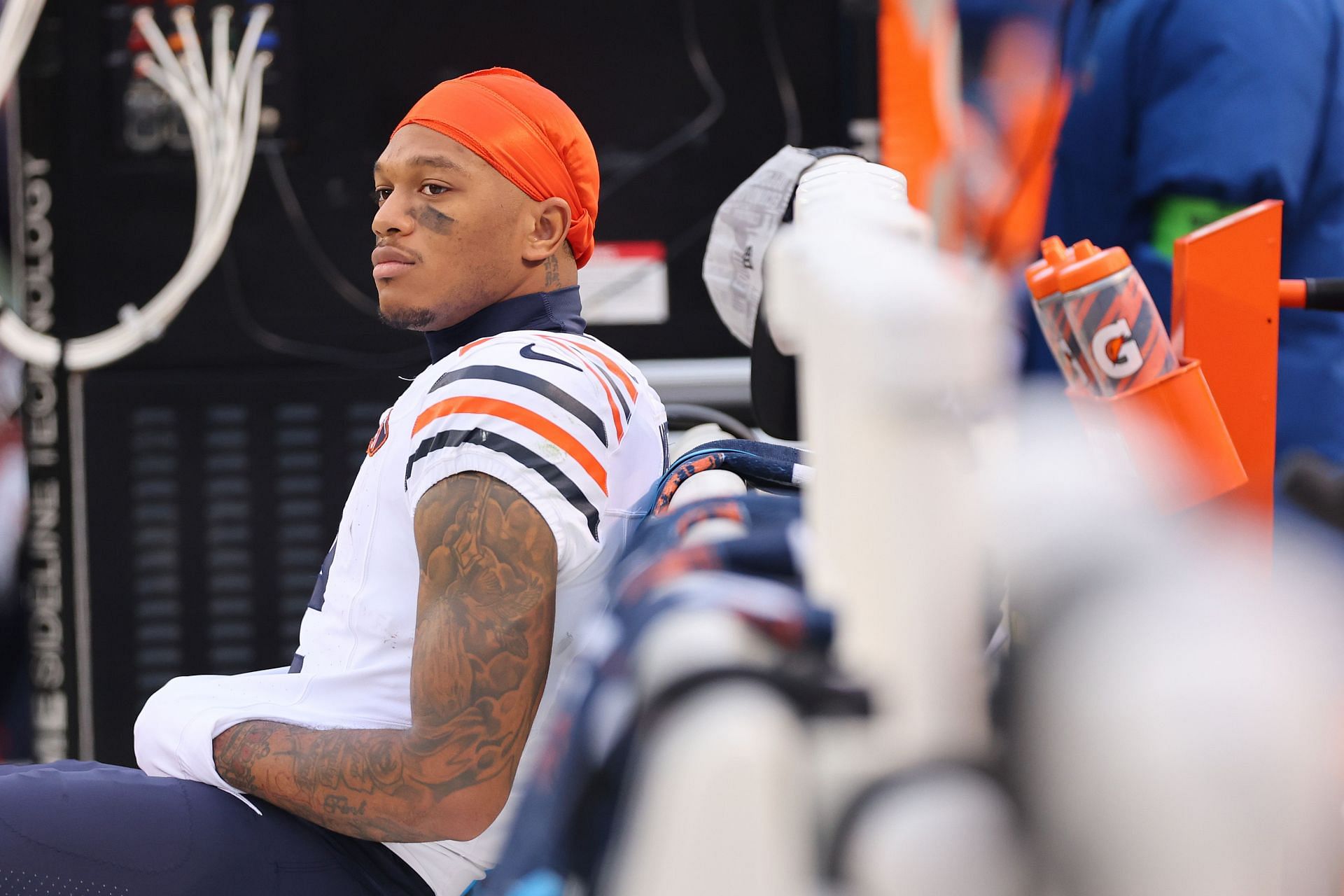 DJ Moore sits on the sidelines during the Bears-Cardinals game