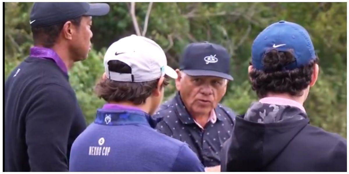 Lee Trevino guiding young golfers