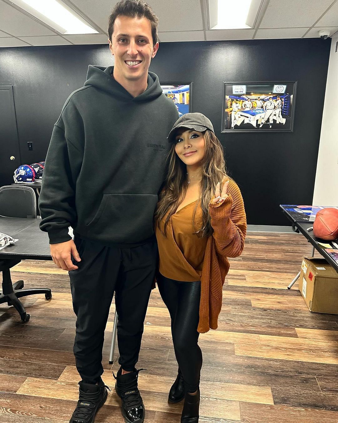 Tommy DeVito (left) with businesswoman and reality star Nicole 